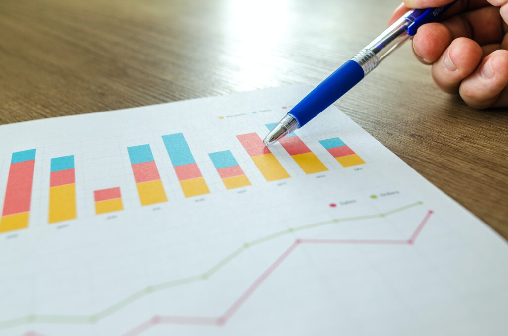 Man analysing his SEO growth for his Australian business on paper.